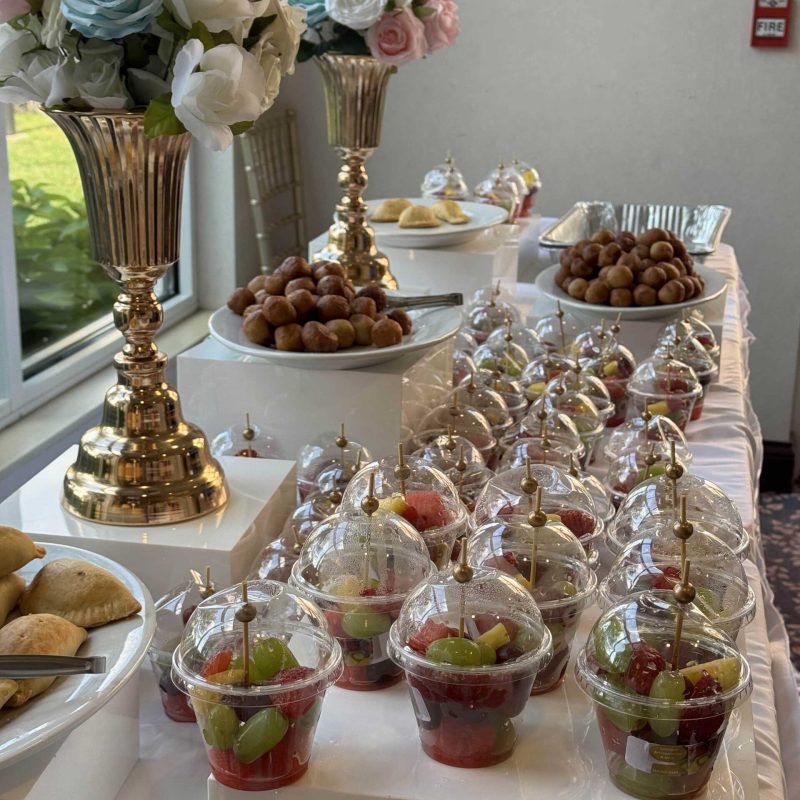 Select The Wellington as your Large Event Space Fishers image shows assortment of food on table